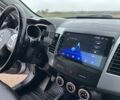 Серый Мицубиси Аутлендер, объемом двигателя 2 л и пробегом 200 тыс. км за 8300 $, фото 23 на Automoto.ua