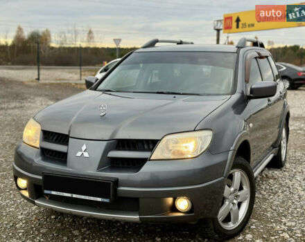 Серый Мицубиси Аутлендер, объемом двигателя 2 л и пробегом 199 тыс. км за 5999 $, фото 6 на Automoto.ua