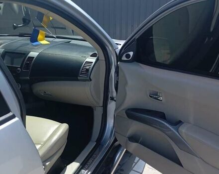 Сірий Міцубісі Аутлендер, об'ємом двигуна 2.4 л та пробігом 220 тис. км за 10200 $, фото 8 на Automoto.ua