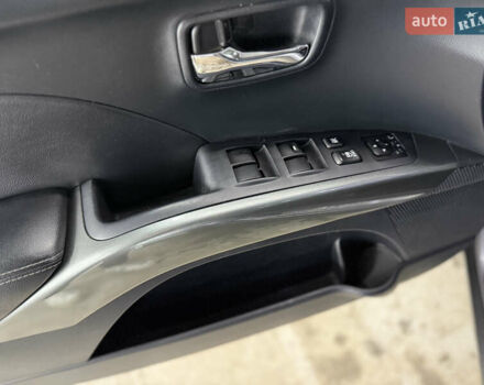 Сірий Міцубісі Аутлендер, об'ємом двигуна 2 л та пробігом 235 тис. км за 8950 $, фото 29 на Automoto.ua