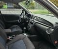 Сірий Міцубісі Аутлендер, об'ємом двигуна 2.38 л та пробігом 200 тис. км за 6500 $, фото 21 на Automoto.ua