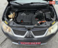 Сірий Міцубісі Аутлендер, об'ємом двигуна 2 л та пробігом 237 тис. км за 8999 $, фото 55 на Automoto.ua