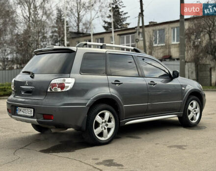 Серый Мицубиси Аутлендер, объемом двигателя 2.38 л и пробегом 254 тыс. км за 7300 $, фото 15 на Automoto.ua