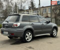 Серый Мицубиси Аутлендер, объемом двигателя 2.38 л и пробегом 254 тыс. км за 7300 $, фото 15 на Automoto.ua