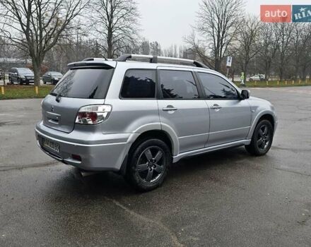 Сірий Міцубісі Аутлендер, об'ємом двигуна 2.38 л та пробігом 230 тис. км за 5400 $, фото 9 на Automoto.ua
