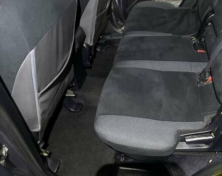 Серый Мицубиси Аутлендер, объемом двигателя 2.4 л и пробегом 238 тыс. км за 7200 $, фото 6 на Automoto.ua