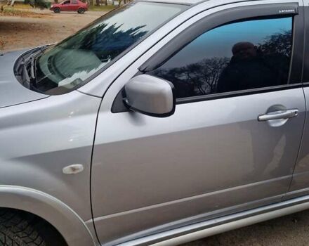 Серый Мицубиси Аутлендер, объемом двигателя 2.38 л и пробегом 113 тыс. км за 8900 $, фото 7 на Automoto.ua