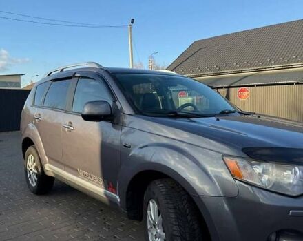 Серый Мицубиси Аутлендер, объемом двигателя 2.18 л и пробегом 287 тыс. км за 10200 $, фото 2 на Automoto.ua