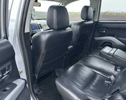 Серый Мицубиси Аутлендер, объемом двигателя 2 л и пробегом 200 тыс. км за 8300 $, фото 17 на Automoto.ua