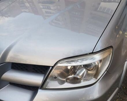 Сірий Міцубісі Аутлендер, об'ємом двигуна 2.38 л та пробігом 209 тис. км за 7460 $, фото 8 на Automoto.ua