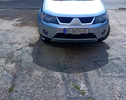 Сірий Міцубісі Аутлендер, об'ємом двигуна 2.4 л та пробігом 245 тис. км за 9800 $, фото 1 на Automoto.ua