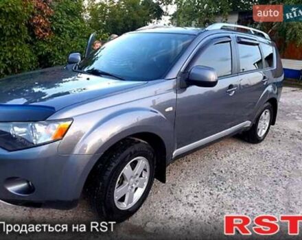 Серый Мицубиси Аутлендер, объемом двигателя 2.4 л и пробегом 223 тыс. км за 8800 $, фото 6 на Automoto.ua