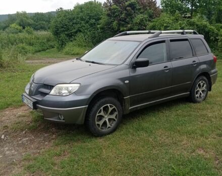 Сірий Міцубісі Аутлендер, об'ємом двигуна 2 л та пробігом 208 тис. км за 6000 $, фото 1 на Automoto.ua