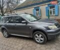 Серый Мицубиси Аутлендер, объемом двигателя 2.38 л и пробегом 143 тыс. км за 7300 $, фото 1 на Automoto.ua