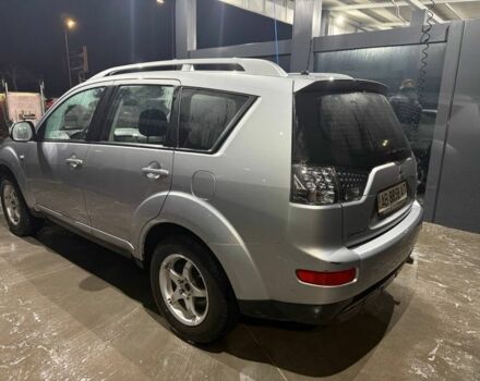 Серый Мицубиси Аутлендер, объемом двигателя 2.4 л и пробегом 208 тыс. км за 7600 $, фото 2 на Automoto.ua