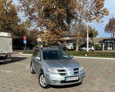 Серый Мицубиси Аутлендер, объемом двигателя 2 л и пробегом 214 тыс. км за 7300 $, фото 7 на Automoto.ua