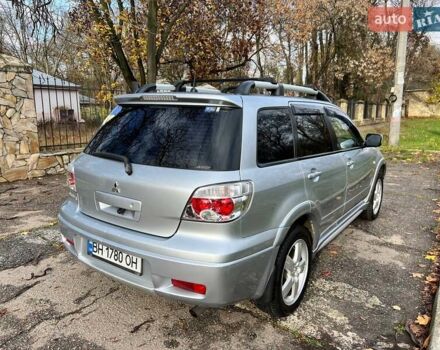 Серый Мицубиси Аутлендер, объемом двигателя 2.38 л и пробегом 170 тыс. км за 6900 $, фото 8 на Automoto.ua