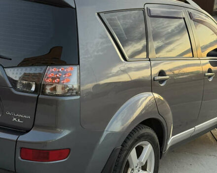 Серый Мицубиси Аутлендер, объемом двигателя 2.4 л и пробегом 210 тыс. км за 8300 $, фото 10 на Automoto.ua