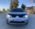Серый Мицубиси Аутлендер, объемом двигателя 1.97 л и пробегом 245 тыс. км за 8700 $, фото 2 на Automoto.ua