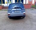 Сірий Міцубісі Аутлендер, об'ємом двигуна 2.4 л та пробігом 245 тис. км за 9800 $, фото 2 на Automoto.ua
