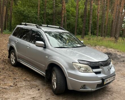 Серый Мицубиси Аутлендер, объемом двигателя 2.4 л и пробегом 225 тыс. км за 6500 $, фото 1 на Automoto.ua