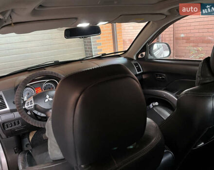 Сірий Міцубісі Аутлендер, об'ємом двигуна 2.36 л та пробігом 195 тис. км за 9500 $, фото 3 на Automoto.ua