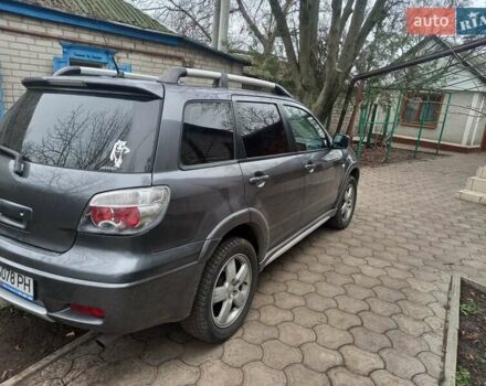 Серый Мицубиси Аутлендер, объемом двигателя 2.38 л и пробегом 143 тыс. км за 7300 $, фото 7 на Automoto.ua