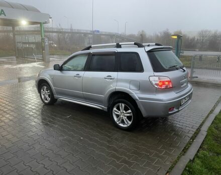 Сірий Міцубісі Аутлендер, об'ємом двигуна 2.4 л та пробігом 299 тис. км за 6300 $, фото 3 на Automoto.ua