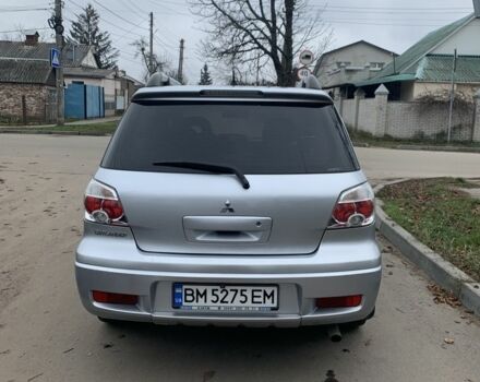 Серый Мицубиси Аутлендер, объемом двигателя 2 л и пробегом 247 тыс. км за 5999 $, фото 3 на Automoto.ua