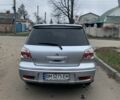 Серый Мицубиси Аутлендер, объемом двигателя 2 л и пробегом 247 тыс. км за 5999 $, фото 3 на Automoto.ua