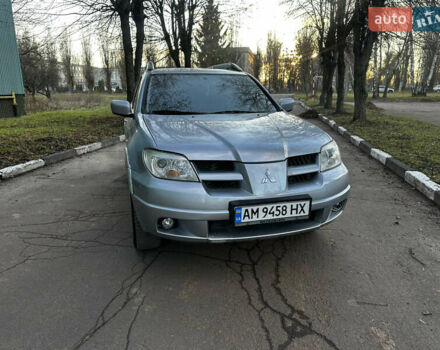 Серый Мицубиси Аутлендер, объемом двигателя 2.4 л и пробегом 320 тыс. км за 6000 $, фото 2 на Automoto.ua