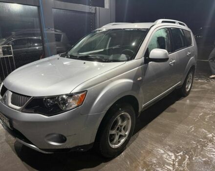 Серый Мицубиси Аутлендер, объемом двигателя 2.4 л и пробегом 208 тыс. км за 7600 $, фото 1 на Automoto.ua