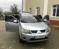 Сірий Міцубісі Аутлендер, об'ємом двигуна 2.4 л та пробігом 247 тис. км за 8100 $, фото 1 на Automoto.ua
