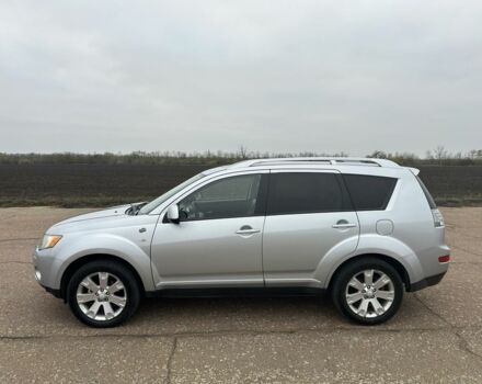 Серый Мицубиси Аутлендер, объемом двигателя 2 л и пробегом 200 тыс. км за 8300 $, фото 3 на Automoto.ua