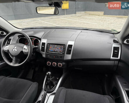 Серый Мицубиси Аутлендер, объемом двигателя 2.2 л и пробегом 162 тыс. км за 10000 $, фото 42 на Automoto.ua