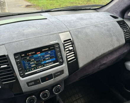 Серый Мицубиси Аутлендер, объемом двигателя 3 л и пробегом 279 тыс. км за 11300 $, фото 12 на Automoto.ua