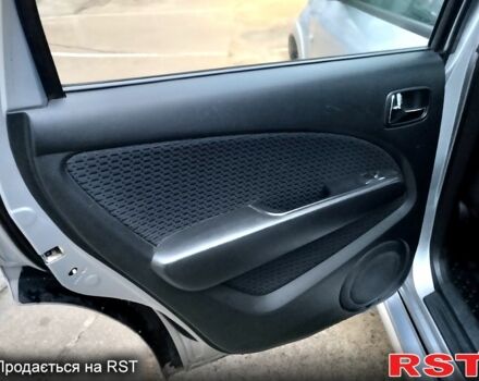 Серый Мицубиси Аутлендер, объемом двигателя 2 л и пробегом 198 тыс. км за 7400 $, фото 8 на Automoto.ua