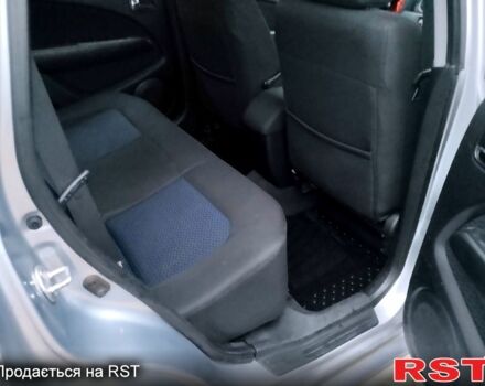 Серый Мицубиси Аутлендер, объемом двигателя 2 л и пробегом 198 тыс. км за 7700 $, фото 13 на Automoto.ua