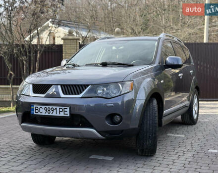 Серый Мицубиси Аутлендер, объемом двигателя 1.97 л и пробегом 242 тыс. км за 8999 $, фото 3 на Automoto.ua