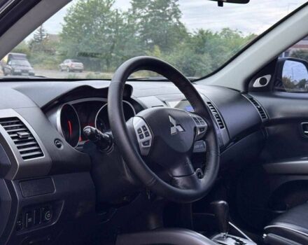 Серый Мицубиси Аутлендер, объемом двигателя 2.4 л и пробегом 171 тыс. км за 9199 $, фото 8 на Automoto.ua