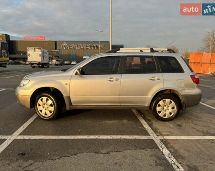 Серый Мицубиси Аутлендер, объемом двигателя 2 л и пробегом 138 тыс. км за 7000 $, фото 3 на Automoto.ua