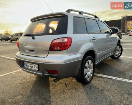 Серый Мицубиси Аутлендер, объемом двигателя 2 л и пробегом 138 тыс. км за 7000 $, фото 6 на Automoto.ua