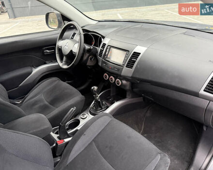 Серый Мицубиси Аутлендер, объемом двигателя 2.2 л и пробегом 162 тыс. км за 10000 $, фото 37 на Automoto.ua