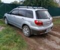 Серый Мицубиси Аутлендер, объемом двигателя 2 л и пробегом 215 тыс. км за 5900 $, фото 1 на Automoto.ua