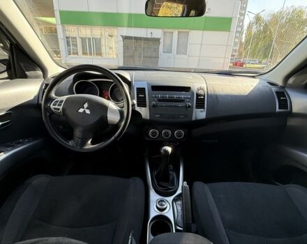 Серый Мицубиси Аутлендер, объемом двигателя 2.4 л и пробегом 43 тыс. км за 9500 $, фото 6 на Automoto.ua