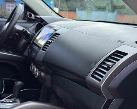 Серый Мицубиси Аутлендер, объемом двигателя 2.4 л и пробегом 171 тыс. км за 9199 $, фото 16 на Automoto.ua