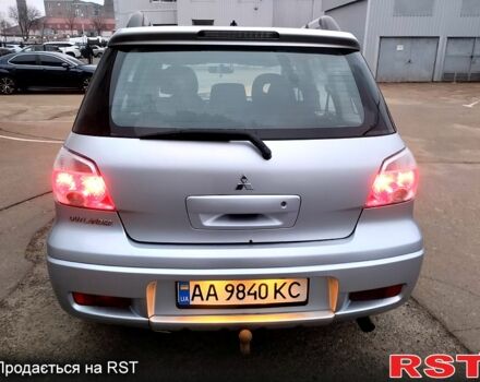 Серый Мицубиси Аутлендер, объемом двигателя 2 л и пробегом 198 тыс. км за 7700 $, фото 5 на Automoto.ua