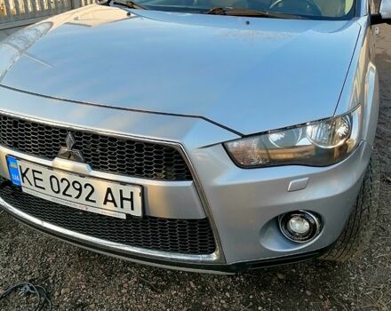 Серый Мицубиси Аутлендер, объемом двигателя 2.2 л и пробегом 247 тыс. км за 10500 $, фото 1 на Automoto.ua