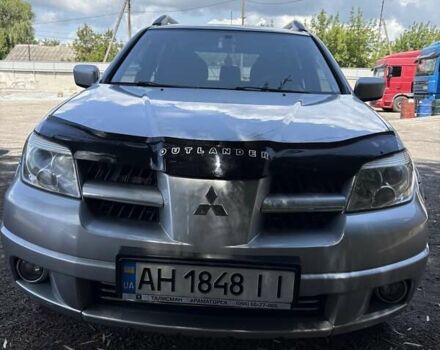 Сірий Міцубісі Аутлендер, об'ємом двигуна 2.38 л та пробігом 127 тис. км за 9999 $, фото 3 на Automoto.ua