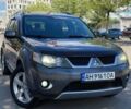 Серый Мицубиси Аутлендер, объемом двигателя 3 л и пробегом 170 тыс. км за 10800 $, фото 1 на Automoto.ua